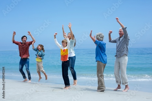 Multi-generation family enjoying at sea shore
