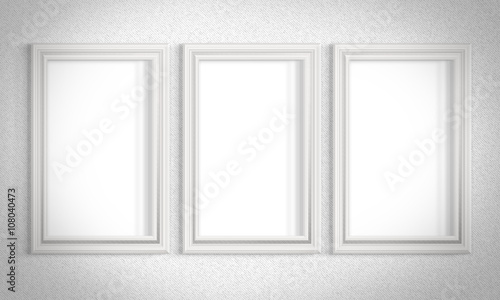 Stylish background with white walls of the gallery and picture frames