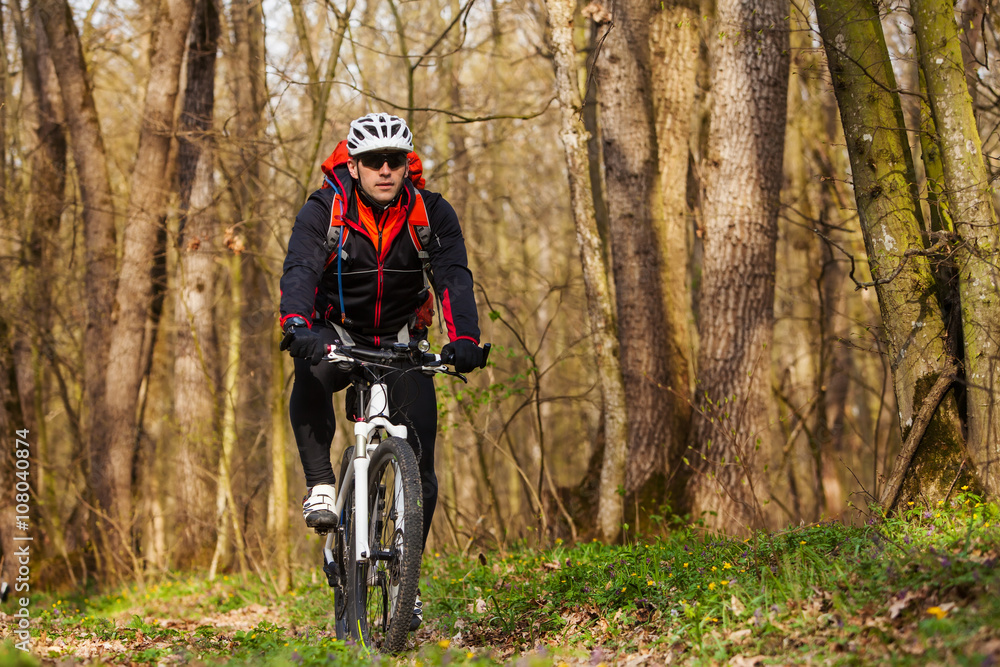 Mountain Bike cyclist riding single track Mountain Bike cyclist riding single track
