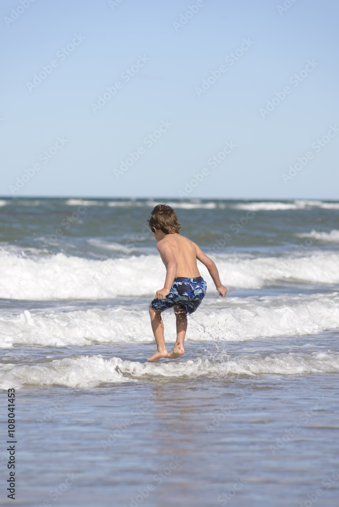 Enjoying the Waves on the Beach Enjoying the Waves on the Beach