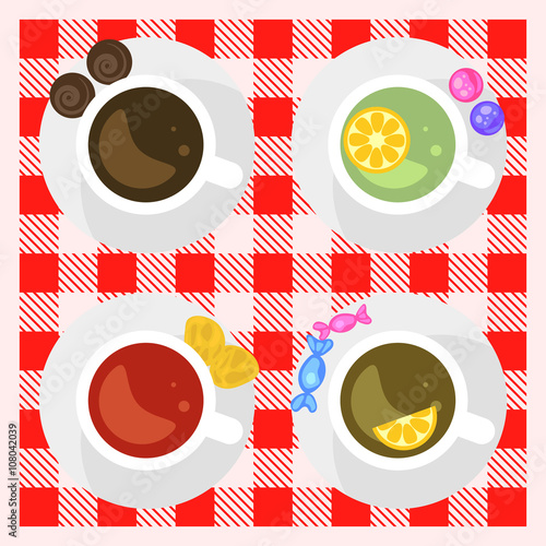 Set of coffee and tea cups top view on a checkered tablecloth surface. Coffee cup, green tea, black tea and red hibiscus tea. Breakfast hot drinks.