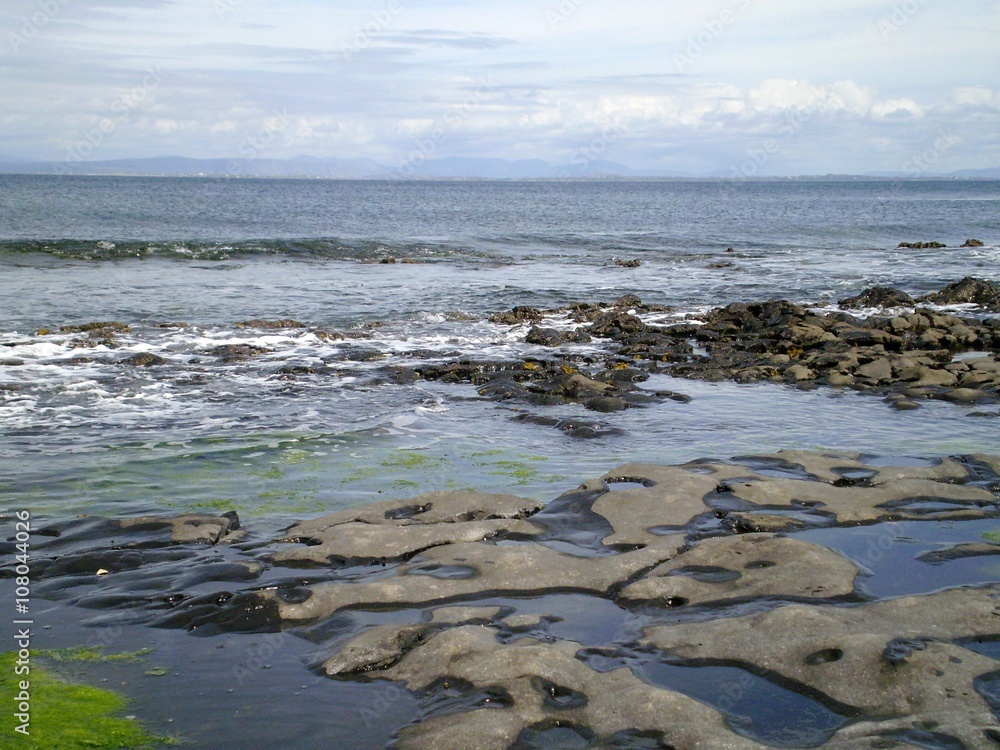Scenic view of Irish rocky beach