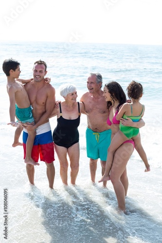 High angle view of happy family at beach 
