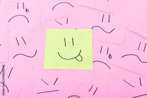 Yellow post it with happy face
