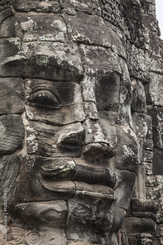 Serenity stone carved face in Bayon temple, Angkor Thom, Cambodia