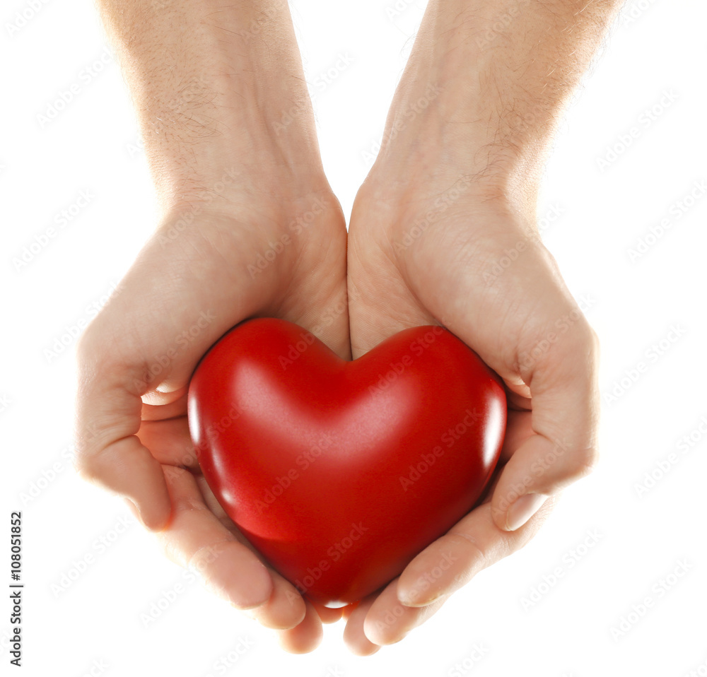 Decorative heart in male hands, isolated on white Decorative heart in male hands, isolated on white