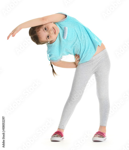 Little cute girl stretching...