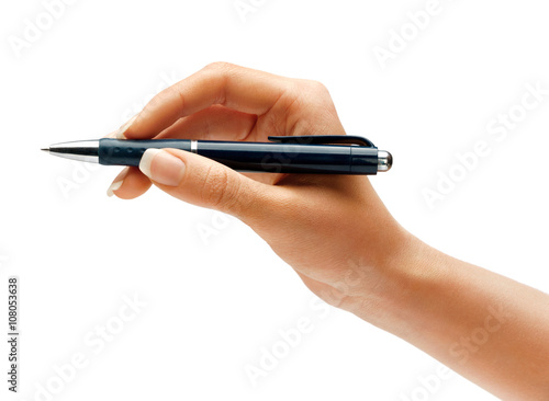 Woman's hand holding a pen isolated on white background. Business concept