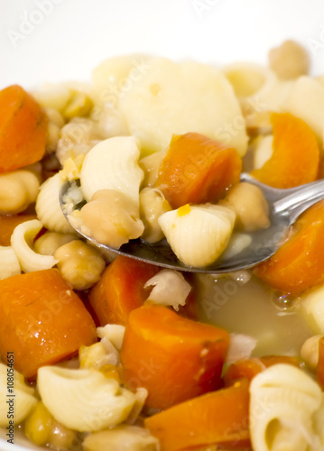 Vegetable soup with pasta, carrots and chickpeas