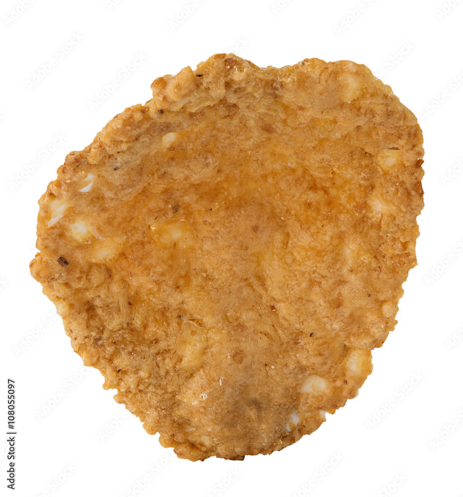 Single whole grain cereal flakes isolated over the white background. Single whole grain cereal flakes isolated over the white background.