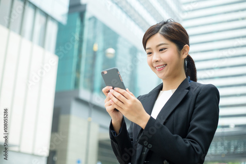 Young Businesswoman use of mobile phone