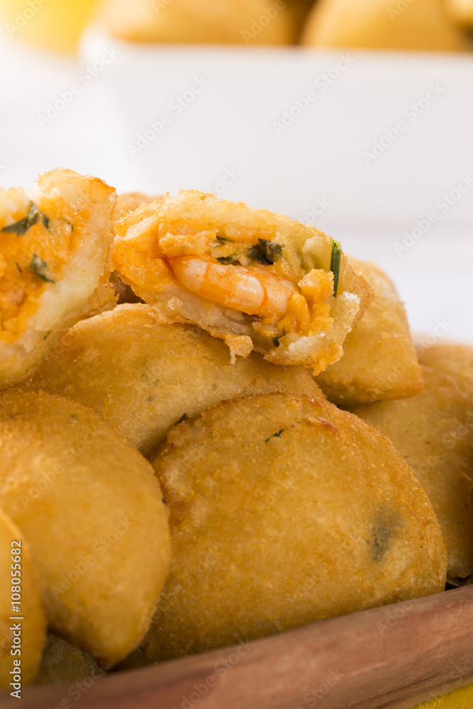 Rissole - Shrimp rissole served with chili sauce on the table. Rissole - Shrimp rissole served with chili sauce on the table.