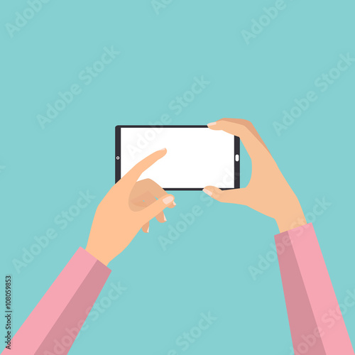 Hand holding smartphone touch screen for taking a photo. 