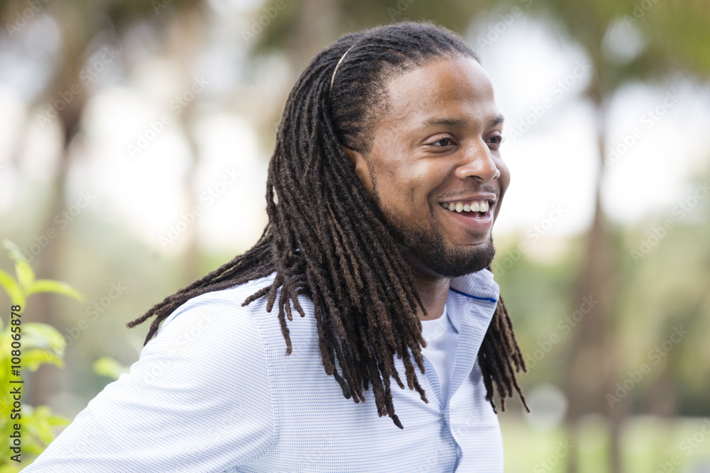 African American businessman standing outdoors African American businessman standing outdoors