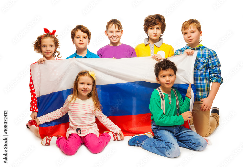 Children holding big flag of Russian Federation Children holding big flag of Russian Federation