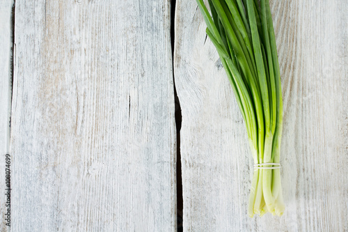 fresh onion on wooden surface