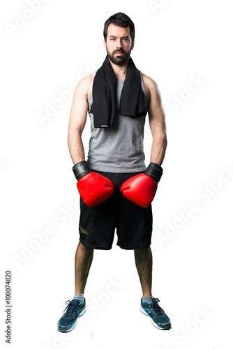 Sportman with boxing gloves © luismolinero