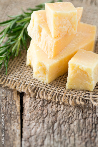 parmesan chees on wooden surface photo