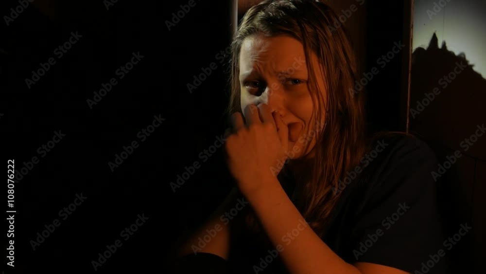 Domestic violence, portrait of abused and hurt young teen woman crying at home. 4K UHD Domestic violence, portrait of abused and hurt young teen woman crying at home. 4K UHD