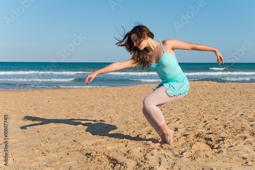 Teenager girl dancing outdoor