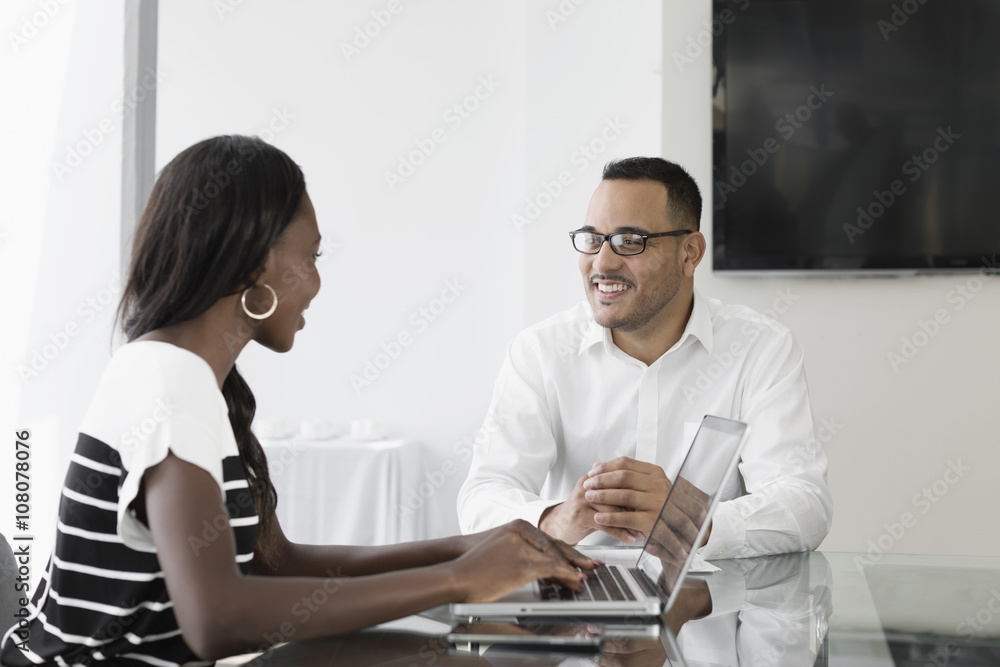 Business people talking in conference room Business people talking in conference room