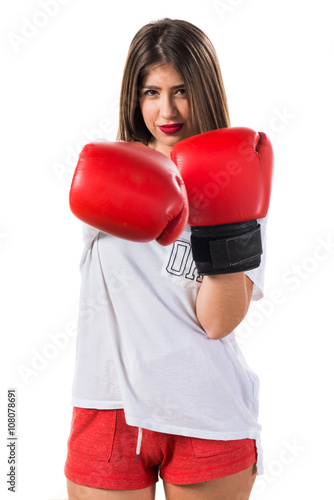 Teen girl with boxing gloves