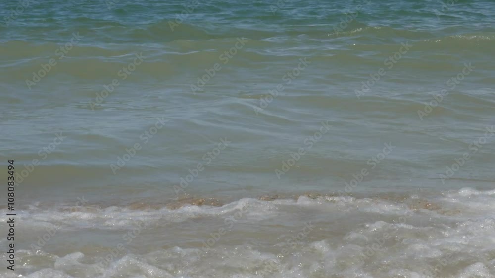 Sea tidal waves spreading on the sandy beach 4K 2160p 30fps UltraHD footage - Sunny day on the ocean beach with foamy waves and windy weather 4K 3840X2160 UHD video Sea tidal waves spreading on the sandy beach 4K 2160p 30fps UltraHD footage - Sunny day on the ocean beach with foamy waves and windy weather 4K 3840X2160 UHD video