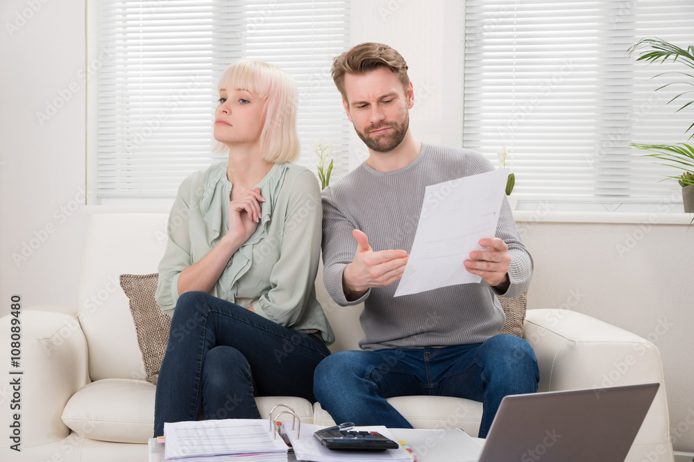 Couple Having Argument Over Bill Couple Having Argument Over Bill