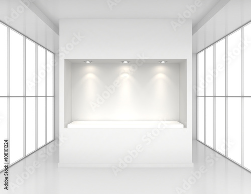 Showcase with lights and podiums for samples product in blank interior room large windows