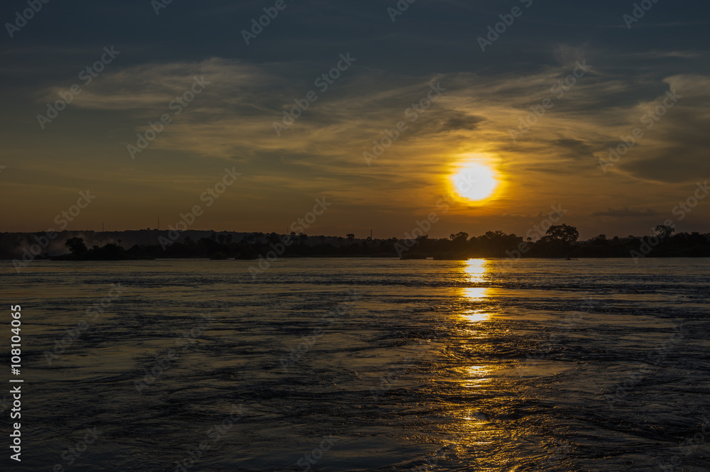Sunset over the Zambezi River, Zambia, The Zambezi is the fourth longest river in Africa Sunset over the Zambezi River, Zambia, The Zambezi is the fourth longest river in Africa
