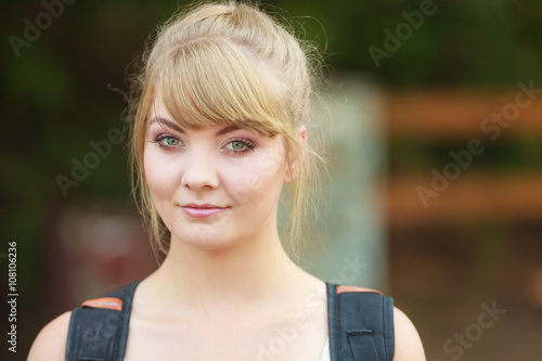 young woman with backpack hiking