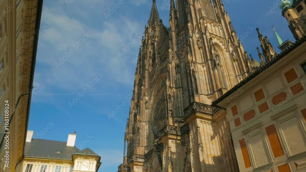 A panoramic cinematic shot of the amazing St Vitus Gothic Cathedral on a sunny day in Prague, Czech Republic (Czechia).
A panoramic cinematic shot of the amazing St Vitus Gothic Cathedral on a sunny day in Prague, Czech Republic (Czechia).