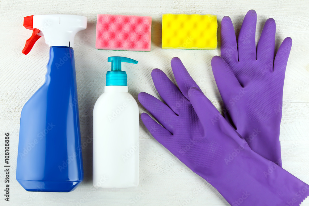 set detergents neatly stacked on white wooden background set detergents neatly stacked on white wooden background