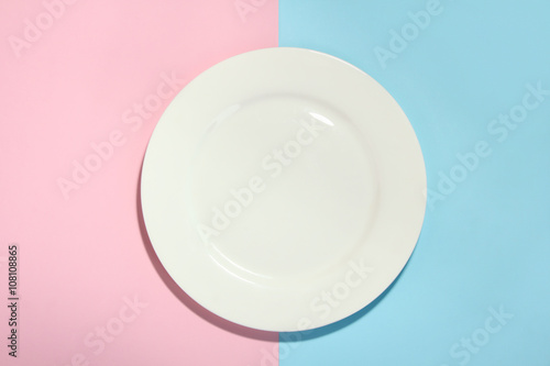 large round platter in pink and blue background
