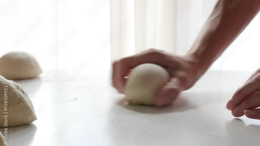 Hand knead dough on table professional way on white background 4K 2160p 30fps UltraHD footage - Kneading dough with hands for making bread or pasta close-up 4K 3840X2160 UHD video Hand knead dough on table professional way on white background 4K 2160p 30fps UltraHD footage - Kneading dough with hands for making bread or pasta close-up 4K 3840X2160 UHD video