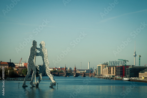 Photography The Molecule Man sculpture on the Spree in Berlin, Germany