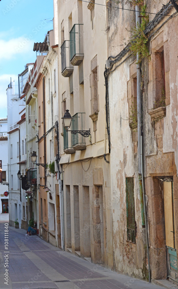 old houses on narrow streets of European cities