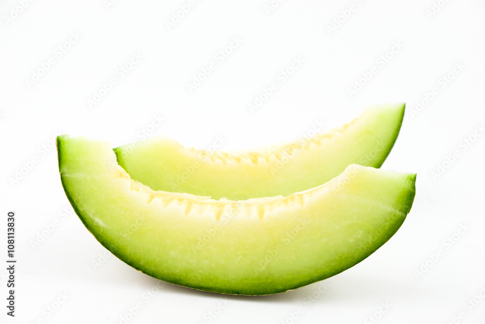Pieces of melon white background Pieces of melon white background