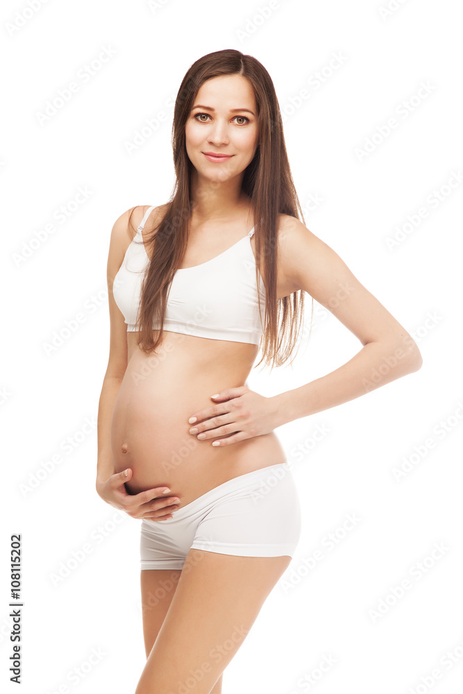 Happy beautiful pregnant woman against white background. Happy beautiful pregnant woman against white background.