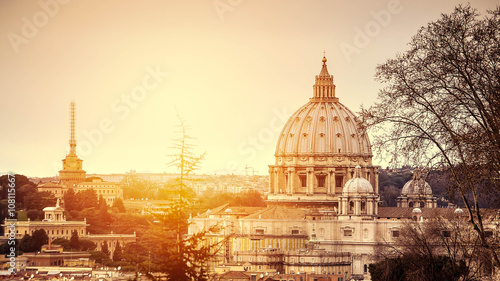 Cityscape of the Rome on the sunset. Basilica of Saint Peter.