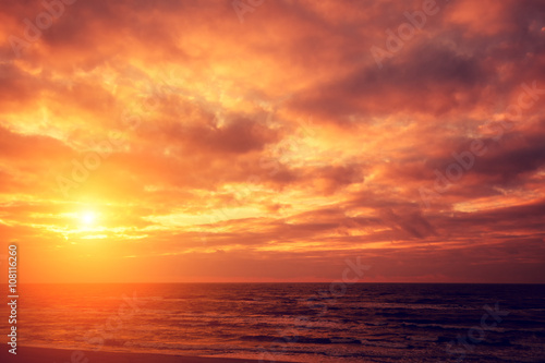 Red bright sunset over sea © vvvita
