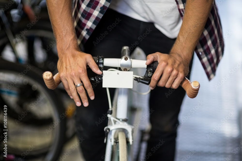 Cool hipster riding a bicycle Cool hipster riding a bicycle