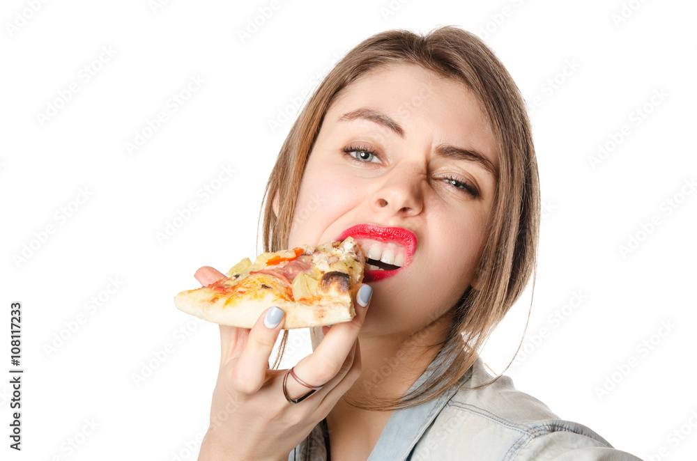 Pretty young sexy woman eating big slice of pizza standing on white background Pretty young sexy woman eating big slice of pizza standing on white background