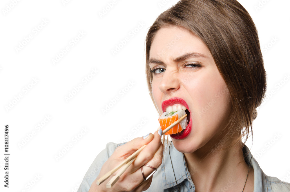 Beauty Woman eating Sushi on white background Beauty Woman eating Sushi on white background
