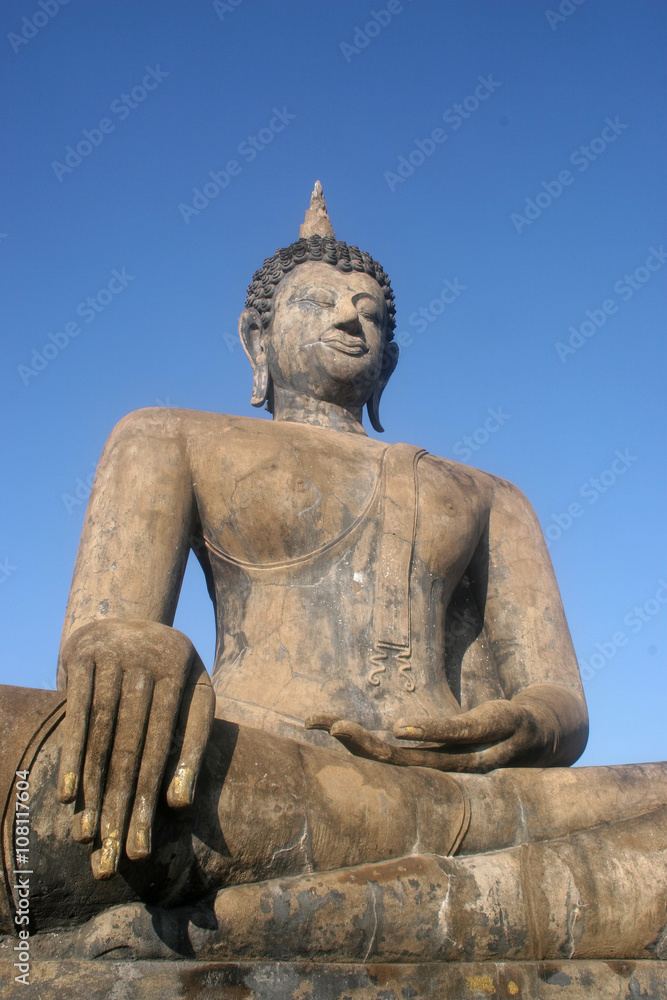 Obraz premium tall Buddha statue historical complex, Sukhothai