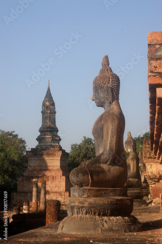 tall Buddha statue historical complex  Sukhothai