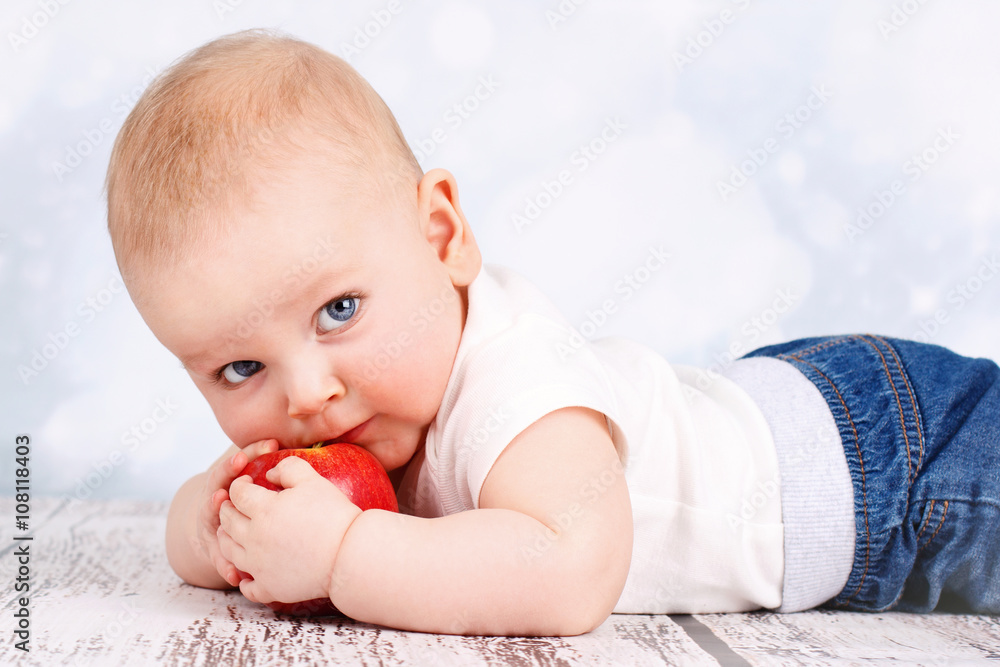 Little toddler eating apple Little toddler eating apple