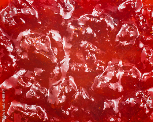 red strawberry jam background