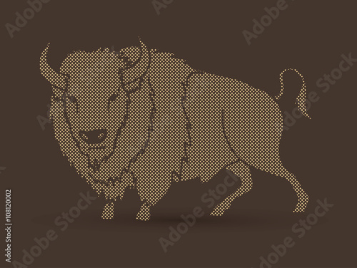 Buffalo standing designed using dots pixels graphic vector.
