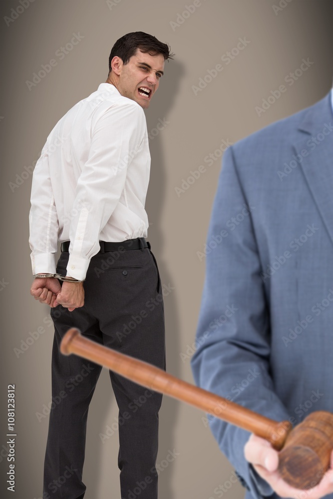Composite image of male lawyer holding scale and gavel Composite image of male lawyer holding scale and gavel